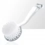 Round brush for manicure and dust with a colorless handle.
